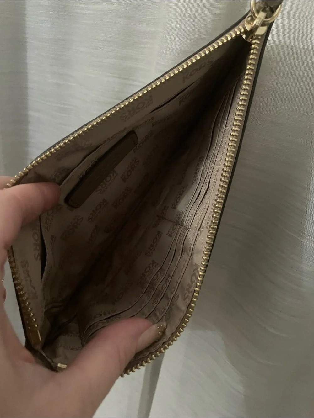 Michael Kors large pebbled Fulton clutch